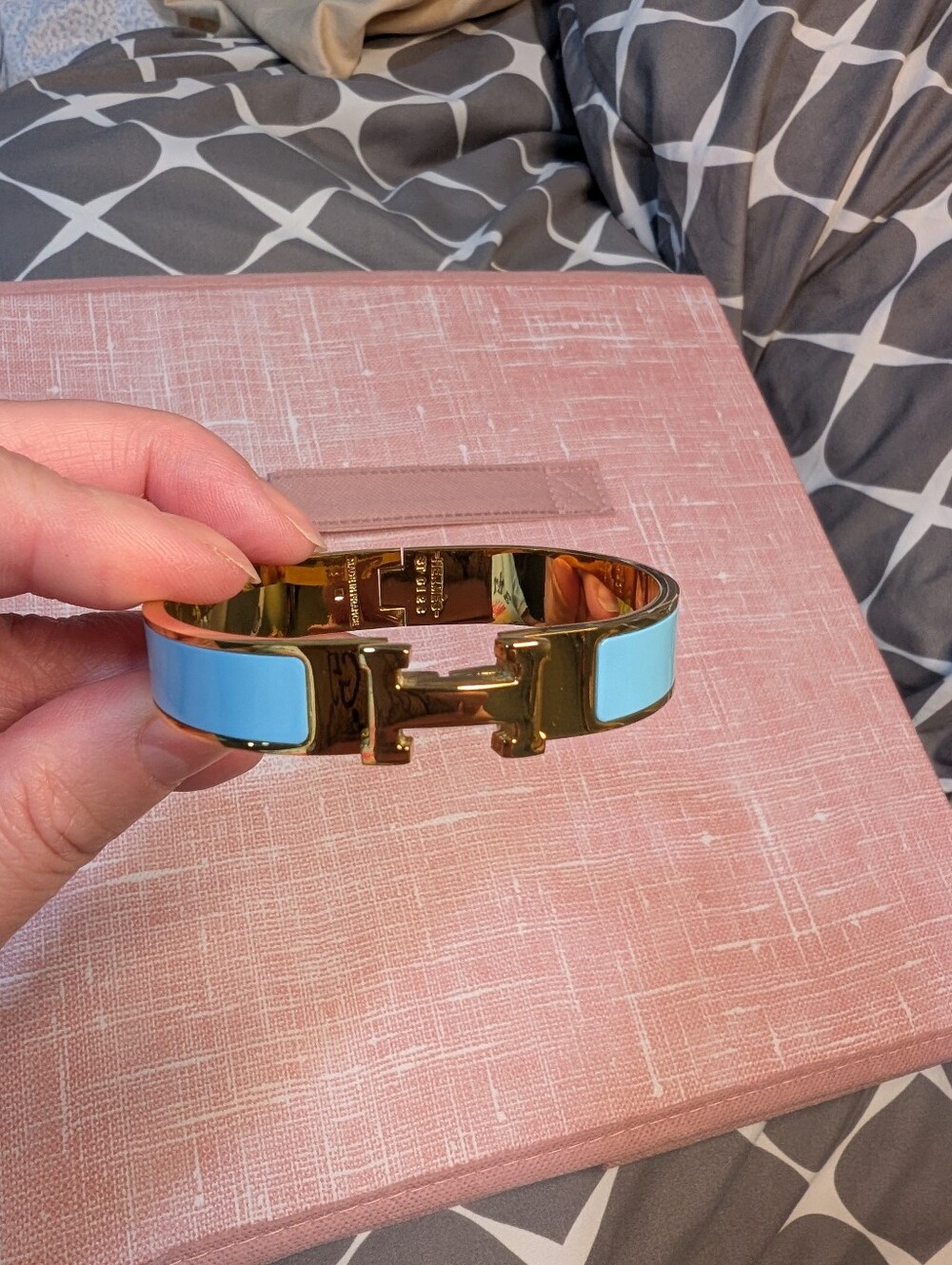 Gold-Tone Bracelet with Light Blue Enamel Accent, H Centerpiece